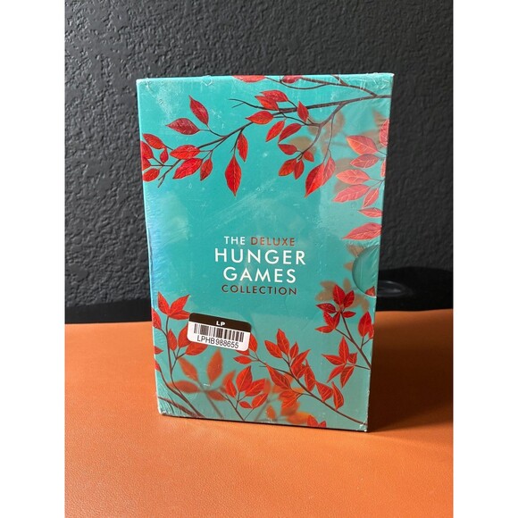 The Deluxe Hunger Games Collection by Suzanne Collins Paper Back  4 Books - Picture 3 of 5